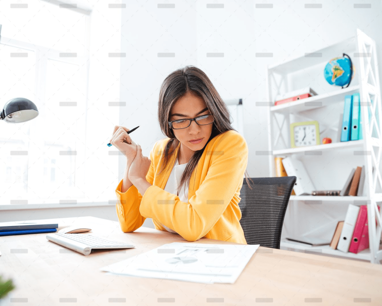 businesswoman-analysing-document-P8WSNMC-1.png